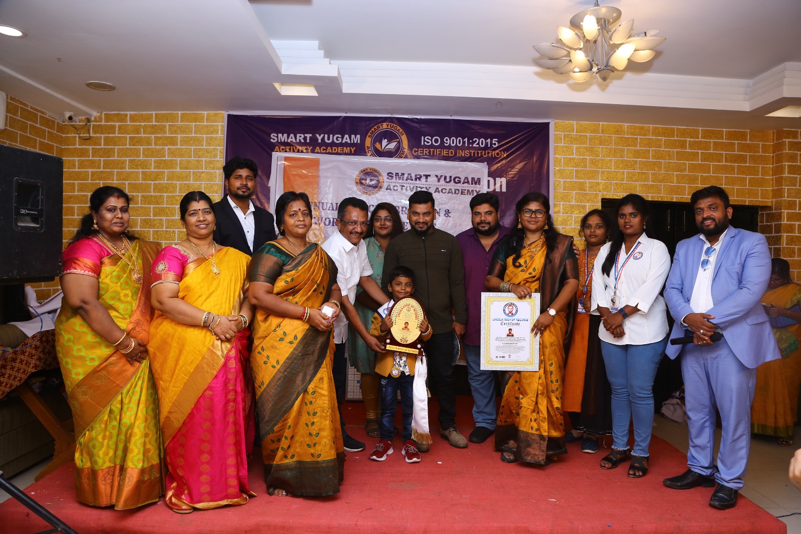 World record by arranging 156 number of 2*2 Rubik's Cube in the   formation of Bharathiyar 's face under the theme of "ROWTHIRAM PAZHAGU"  by reciting Bharathiyar 's Puthiya Aathichudi SIMULTANEOUSLy in least time.